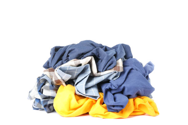 istock Bunch of clothes isolated on white background 1186300199