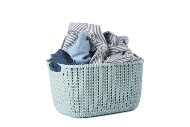istock Basket with clothes isolated on white background 1186300286
