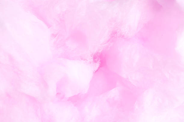 Pink Sweet cotton candy, closeup Pink Sweet cotton candy, closeup candyfloss stock pictures, royalty-free photos & images