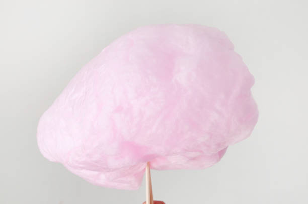 istock Sweet pink cotton candy on white background. 1186302925
