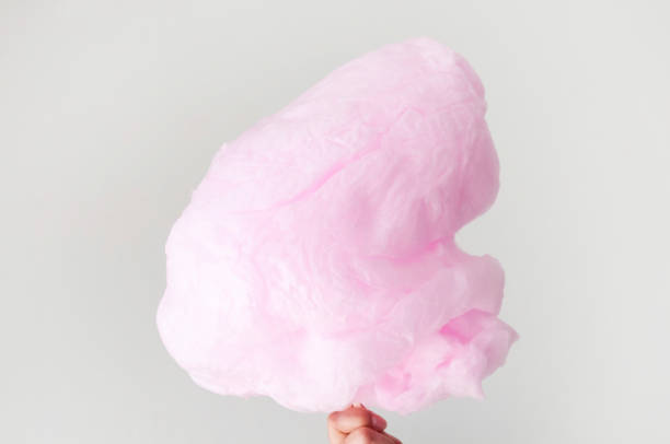 istock Sweet pink cotton candy on white background. 1186302969