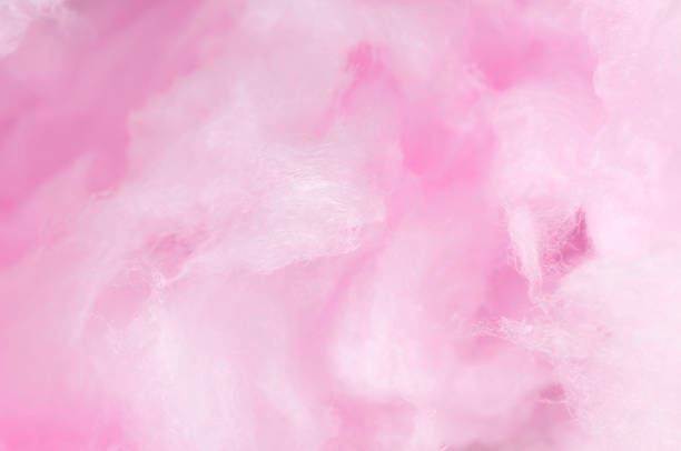 Pink Sweet cotton candy, closeup Pink Sweet cotton candy, closeup candyfloss stock pictures, royalty-free photos & images