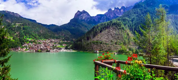 beautiful Alleghe village and lake in Belluno province, Veneto region of Italy