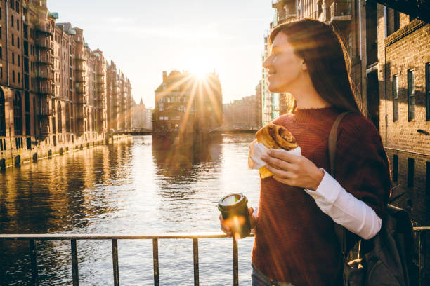 istock Woman exploring Hamburg old town 1186304876