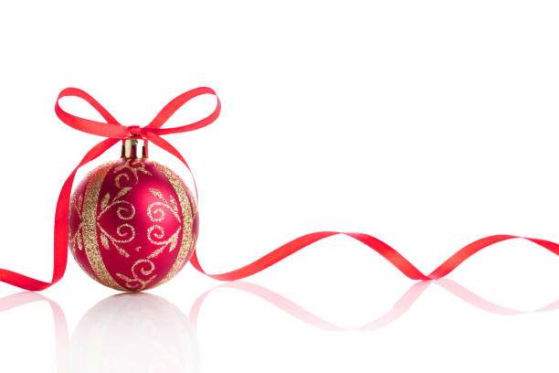 istock Christmas ball and bow isolated on white background 1186315068