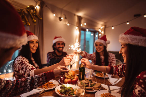 istock people have fun at dinner for christmas 1186320718