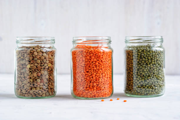 istock Dried Mung beans, and lentils in glass jars 1186322443