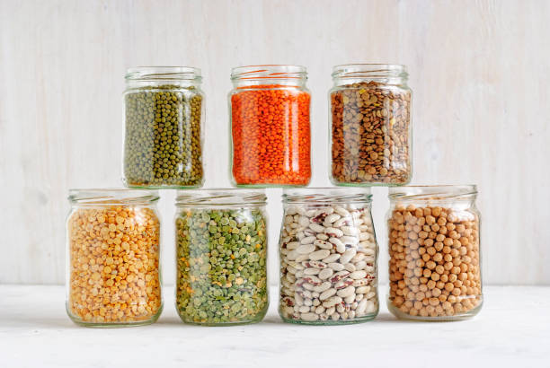 istock Mung beans, peas, beans, lentils in glass jars 1186322621