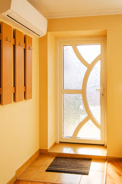 istock Designer glass front door with curved panels 1186323331