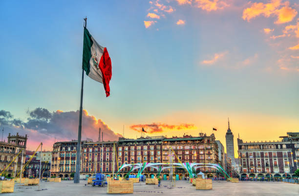 Flagpole on Constitution Square in Mexico City Flagpole on Constitution or Zocalo Square in Mexico City constitucion photos stock pictures, royalty-free photos & images