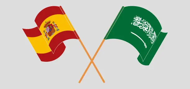 Vector illustration of Crossed and waving flags of the Kingdom of Saudi Arabia and Spain