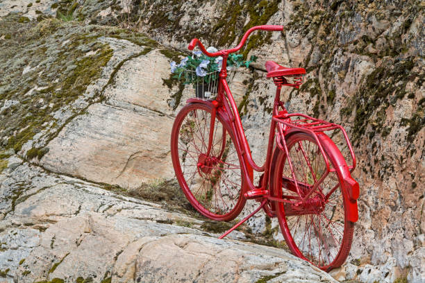 istock Lady bike in rocks 1186326648
