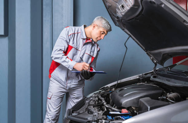 Auto Mechanic Service Form Filling the Engine in the Car