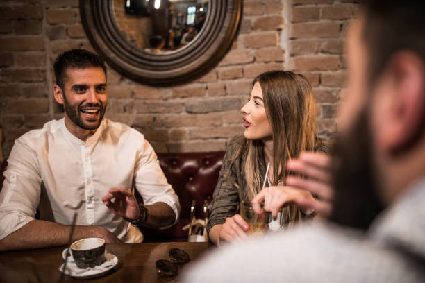 istock Friends relaxing in cafe 1186330957