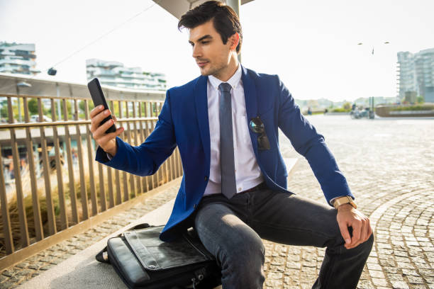 istock young  businessman with smartphone 1186337774