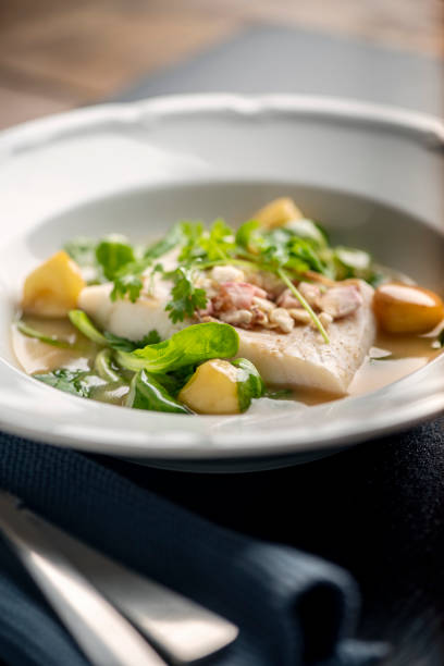 istock Cod fillet with beurre blanc sauce and apple. 1186342275