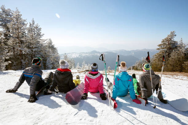 istock Happy couple having fun in snowy nature 1186342561