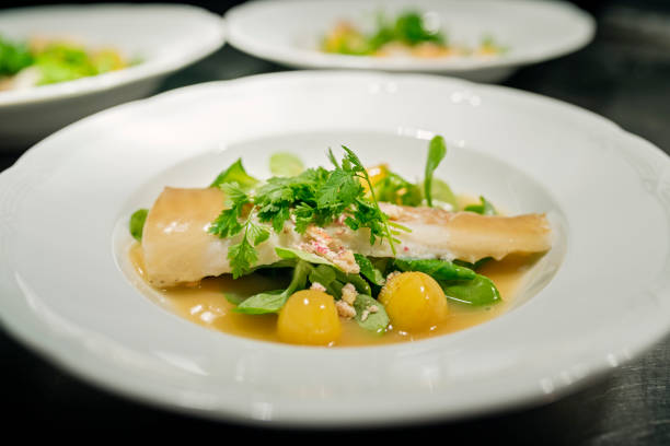 istock Cod fillet with beurre blanc sauce and apple. 1186342674