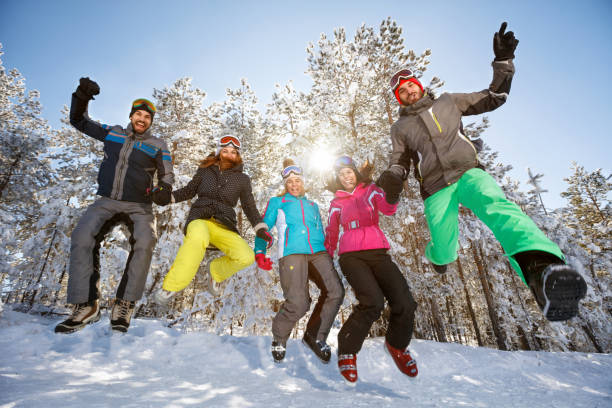istock Happy couple having fun in snowy nature 1186344339