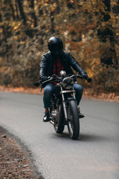 istock Vintage motorcycle ride in the woods 1186347542