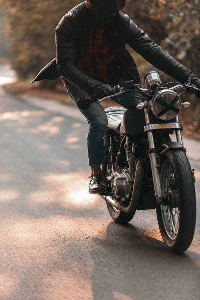 istock Vintage motorcycle ride in the woods 1186348142