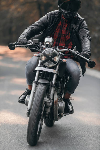 istock Vintage motorcycle ride in the woods 1186348148