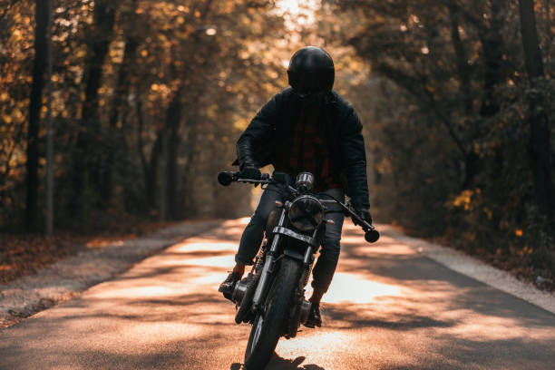 istock Vintage motorcycle ride in the woods 1186348165