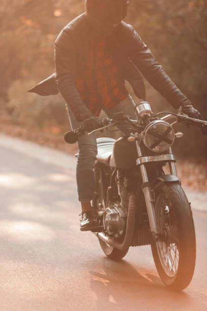 istock Vintage motorcycle ride in the woods 1186348178