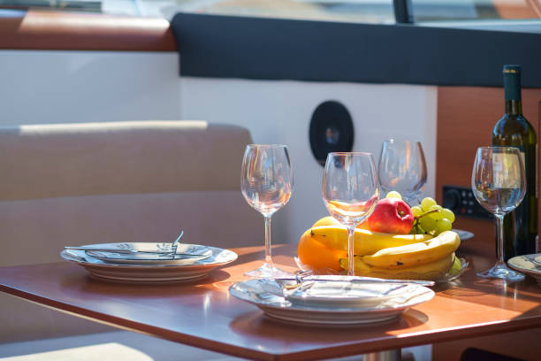 istock Setout table - tableware, sweet fruits, wine and glasses 1186349964
