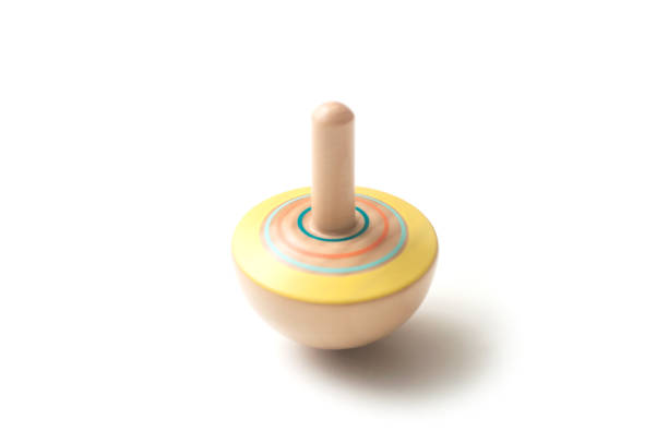 istock wooden whirligig on white background 1186350008