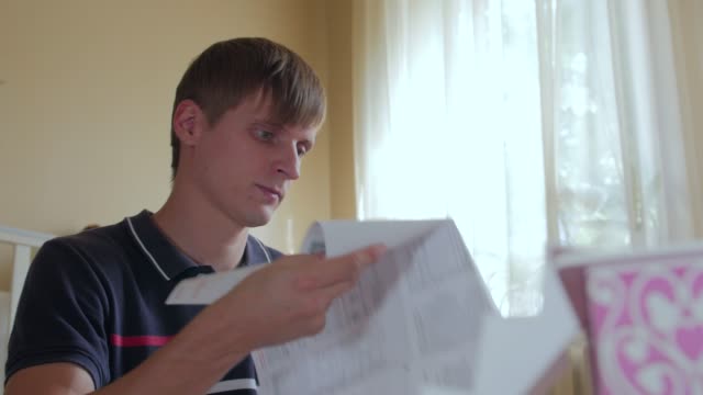 Young Man Read Manual