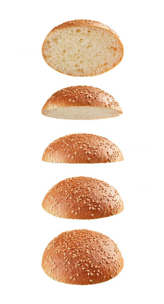 istock Burger bun tops flying on white background 1186354112