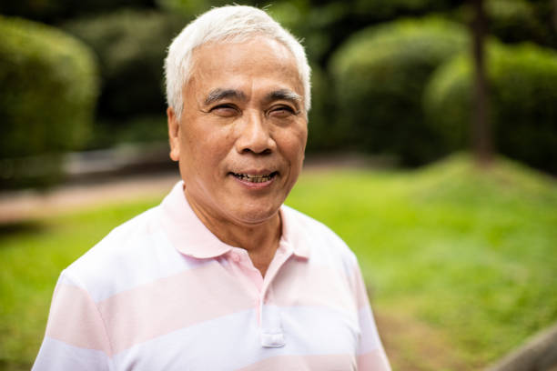 istock Senior Taiwanese man in public park 1186355618