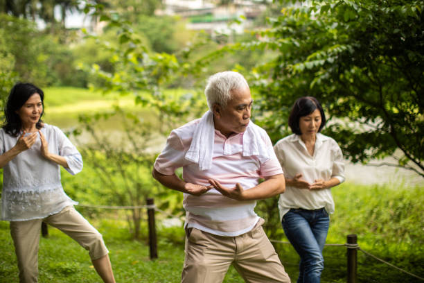 Taiwanese people practicing yoga in public park
