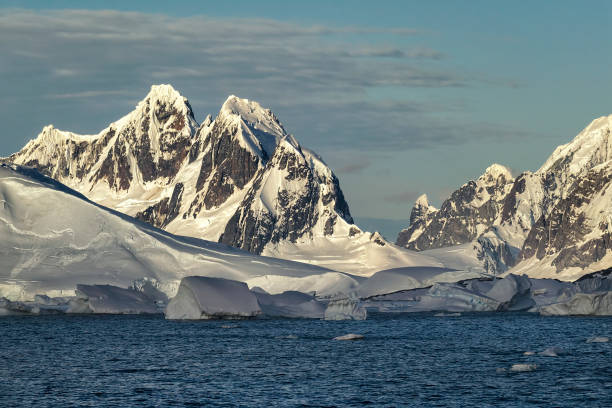 istock Jagged Mountains along the Antarctica Peninsula 1186357040