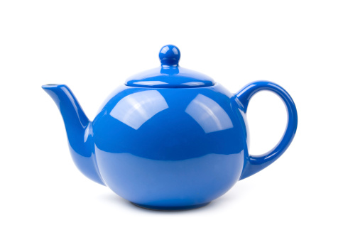 A bright blue ceramic standard design teapot isolated on white