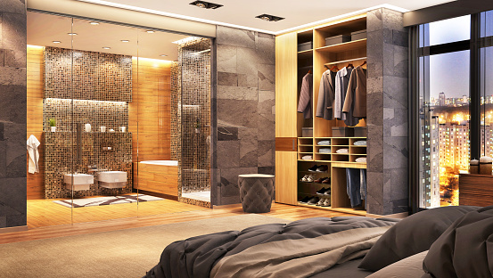 Luxury hotel room with large bathroom and closet