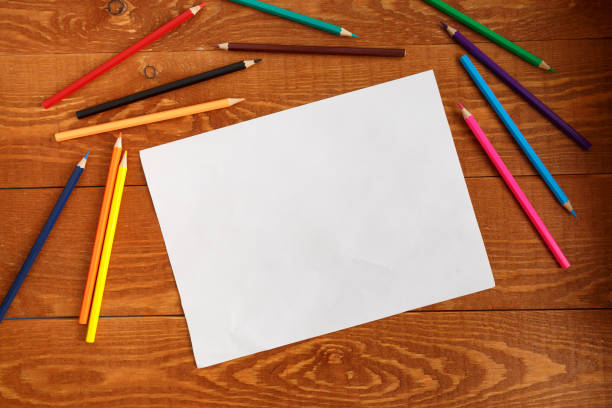 istock Blank List of Paper and Different Colored Pencils 1186359644