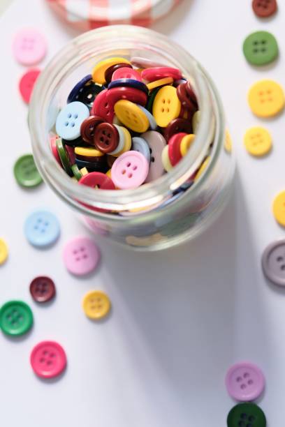 istock Large Group Of Colorful Plastic Sewing Buttons On Table 1186361067