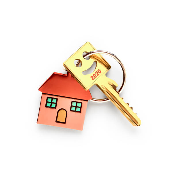 istock Key with house keychain and number 2020 1186361146