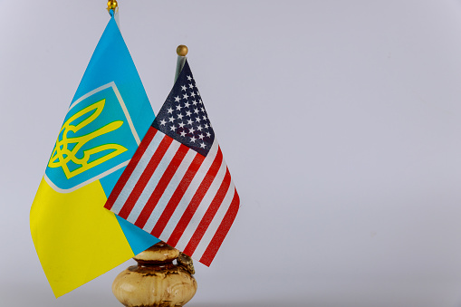 Ukrainian national flags and American flag Symbol of American Ukrainian friendship