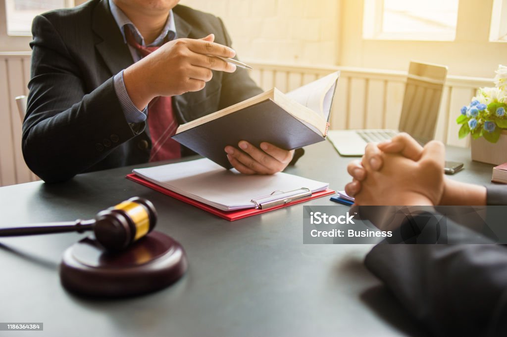 Lawyer are currently providing legal advice to clients.Legal planning Lawyer Stock Photo