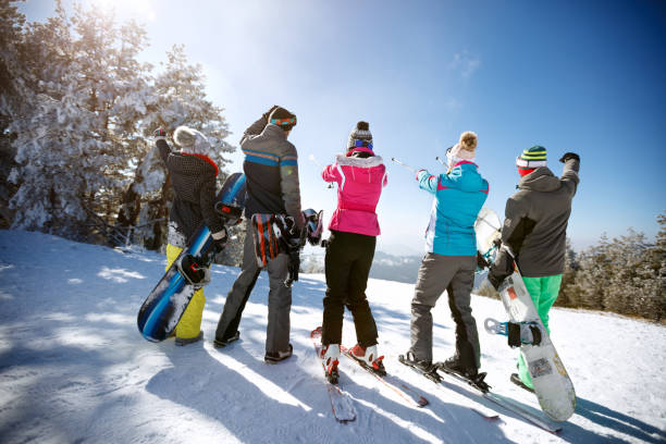 istock Happy couple having fun in snowy nature 1186369203