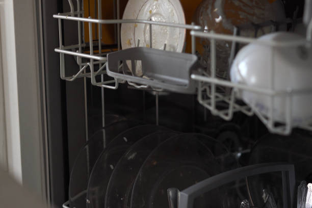 istock dirty dishes in the dishwasher 1186372866