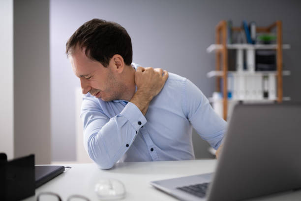istock Businessman Having Neck Pain 1186375103