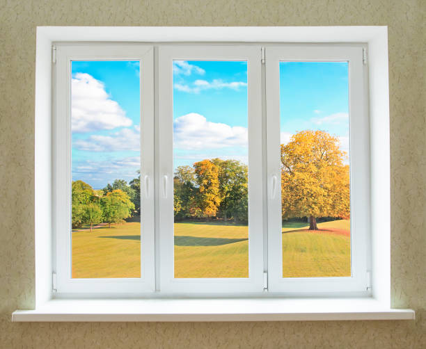 istock View through a modern PVC window onto beautiful autumn landscape 1186376813