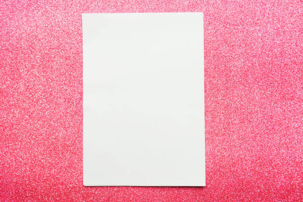 istock white mockup blank on pink glitter background 1186377971