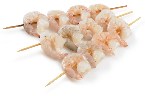 shrimps on the spit isolatet on white.