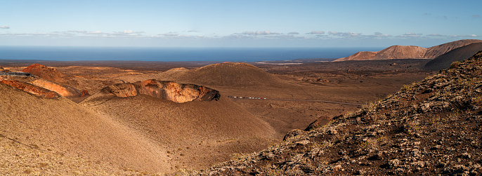 panoramic view of colorful volcanic landscape at Timanfaya National Park, montanas del fuego, on Lanzarote, Canary Islands photo
