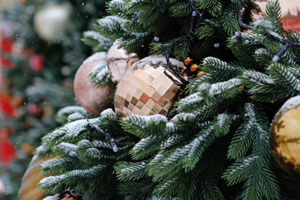 istock Golden disco ball hanging on the Christmas tree 1186382951